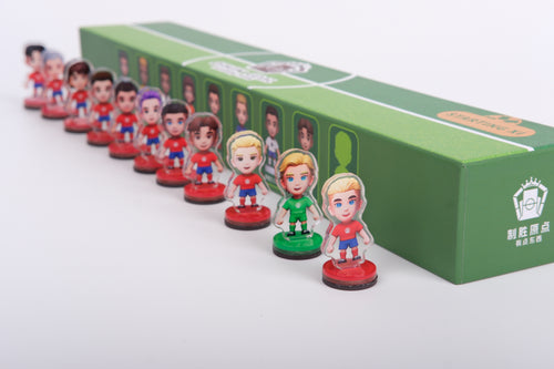 Complete 11-man squad of Origin Goal acrylic football standees next to the mystery box