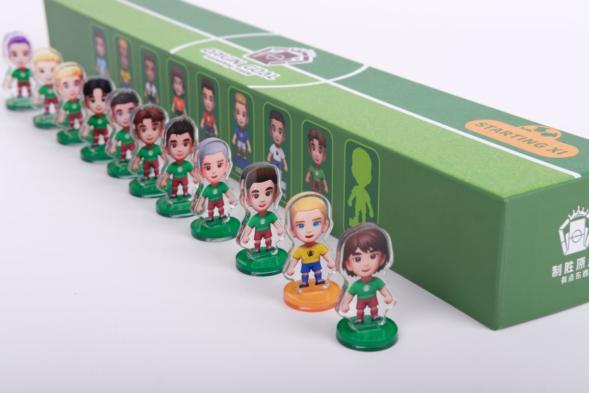 Origin Goal Starting XI figures on magnetic bases beside the mystery box